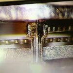 Detail van een rondsel in het vastgelopen King Seiko uurwerk